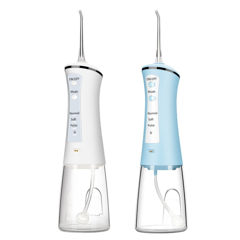 Newest Electric Oral Dental Irrigator Portable Water Jet Flosser with USB charging, showcasing its sleek design and included nozzles.