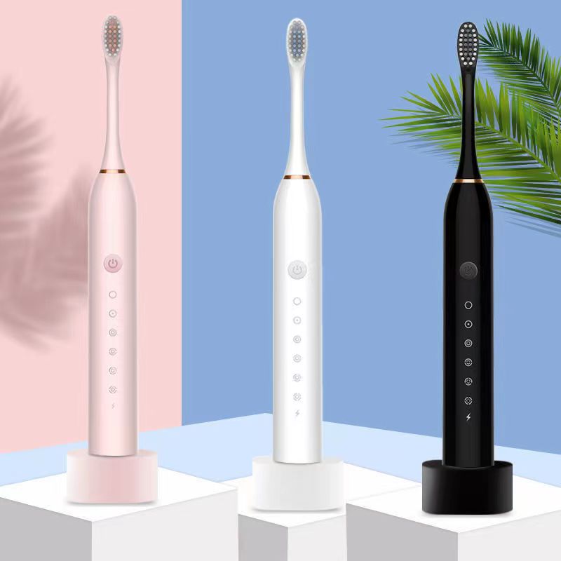 Newest Ultrasonic Electric Toothbrush with USB charger base, featuring 6 modes and waterproof design, ideal for adults and travel.