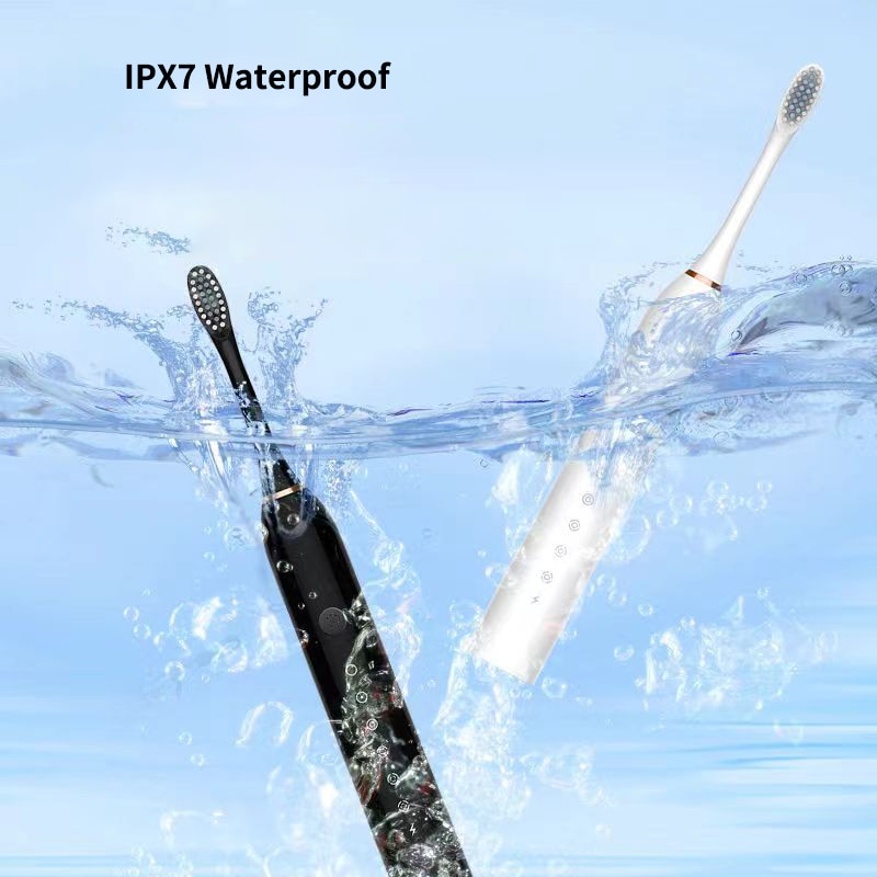 Newest Ultrasonic Electric Toothbrush with USB charger base, featuring 6 modes and waterproof design, ideal for adults and travel.