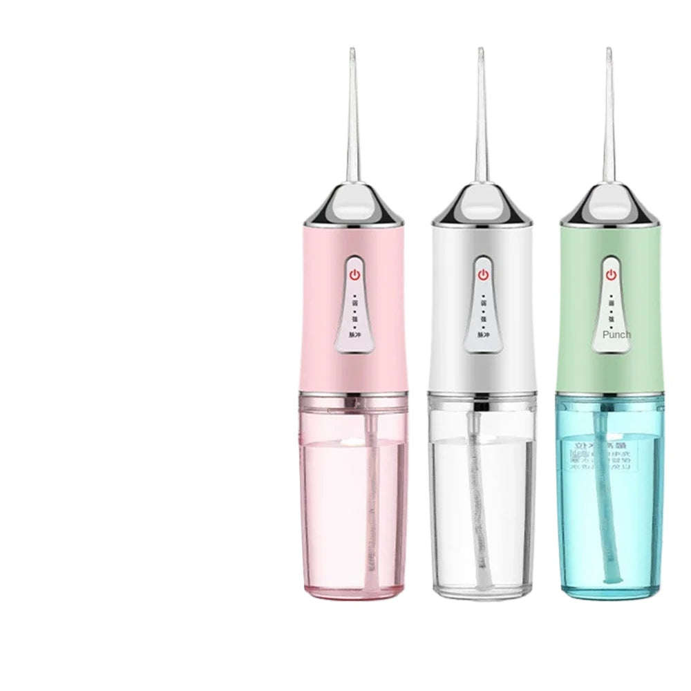 Portable Dental Water Flosser in white and pink with USB charging cable and cleaner heads, designed for effective oral hygiene.
