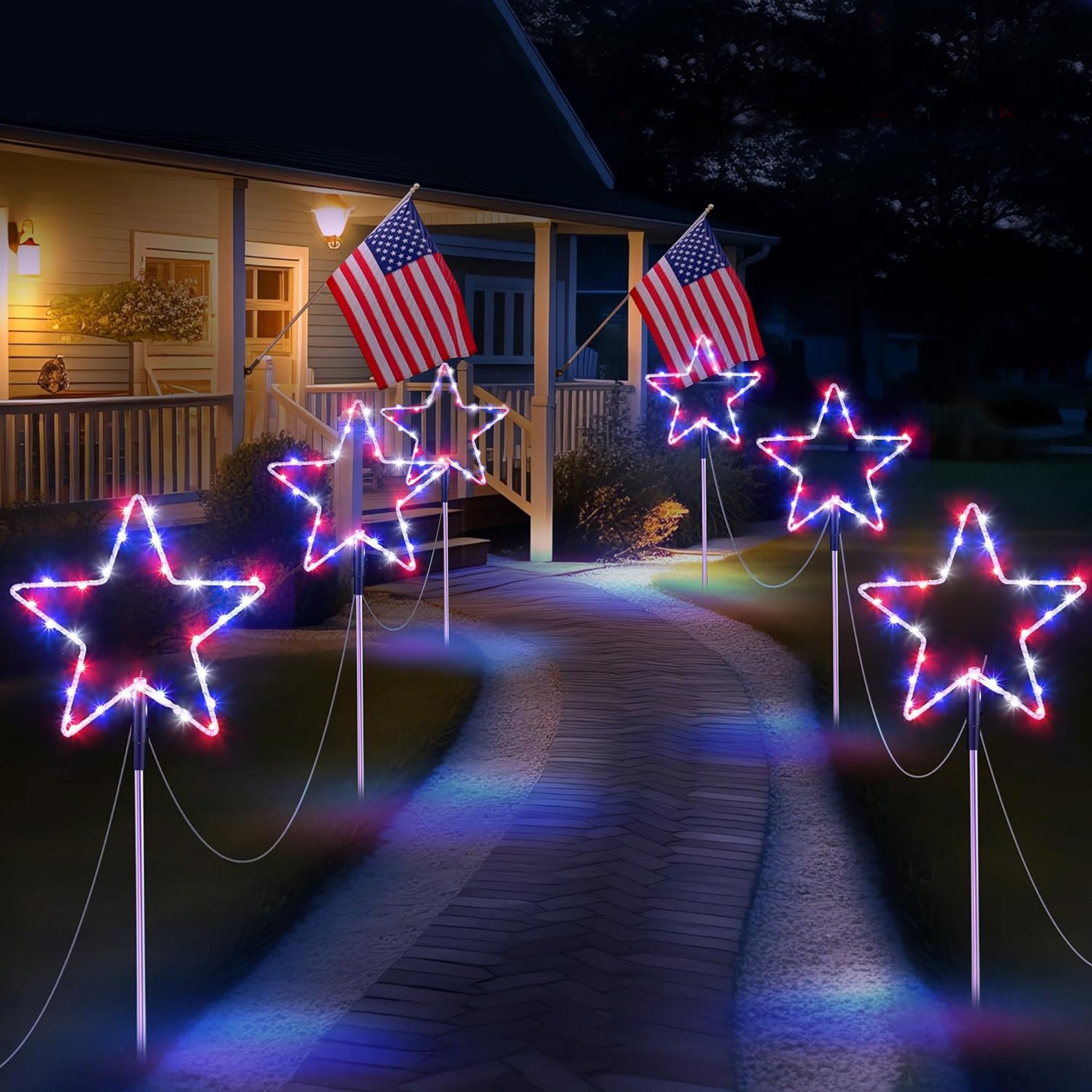 A set of 6 outdoor solar pathway lights shaped like stars, glowing in red, white, and blue colors, perfect for patriotic decorations.