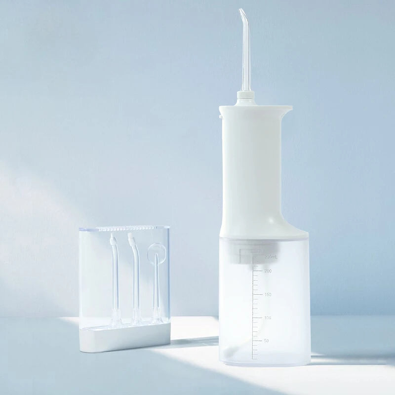 Portable Oral Irrigator Water Flosser with a sleek design, featuring a water tank and nozzle for effective oral cleaning.