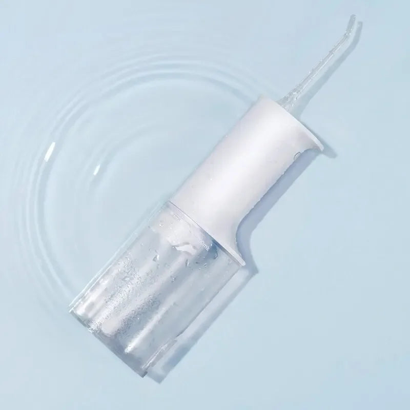 Portable Oral Irrigator Water Flosser with a sleek design, featuring a water tank and nozzle for effective oral cleaning.