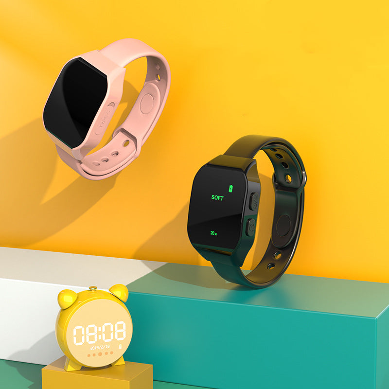 A Portable Pulse Soothing Insomnia Massage Instrument in white, showcasing its sleek design and digital display.