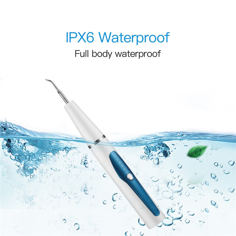 Portable Ultrasonic Dental Scaler with stainless steel cleaning head and ergonomic design for effective tooth cleaning.