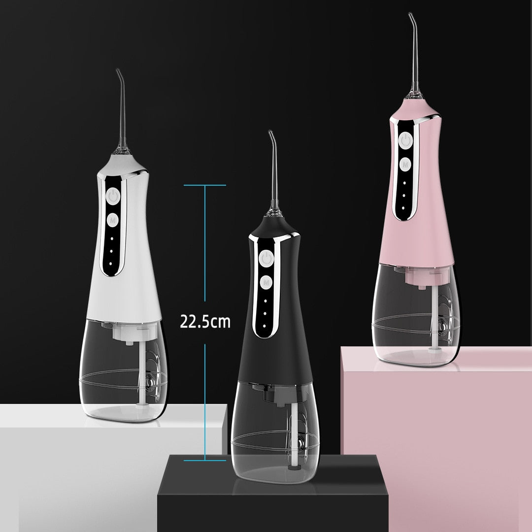 Smart Dental Water Jet Flosser with multiple nozzles and charging cable, designed for effective oral hygiene.