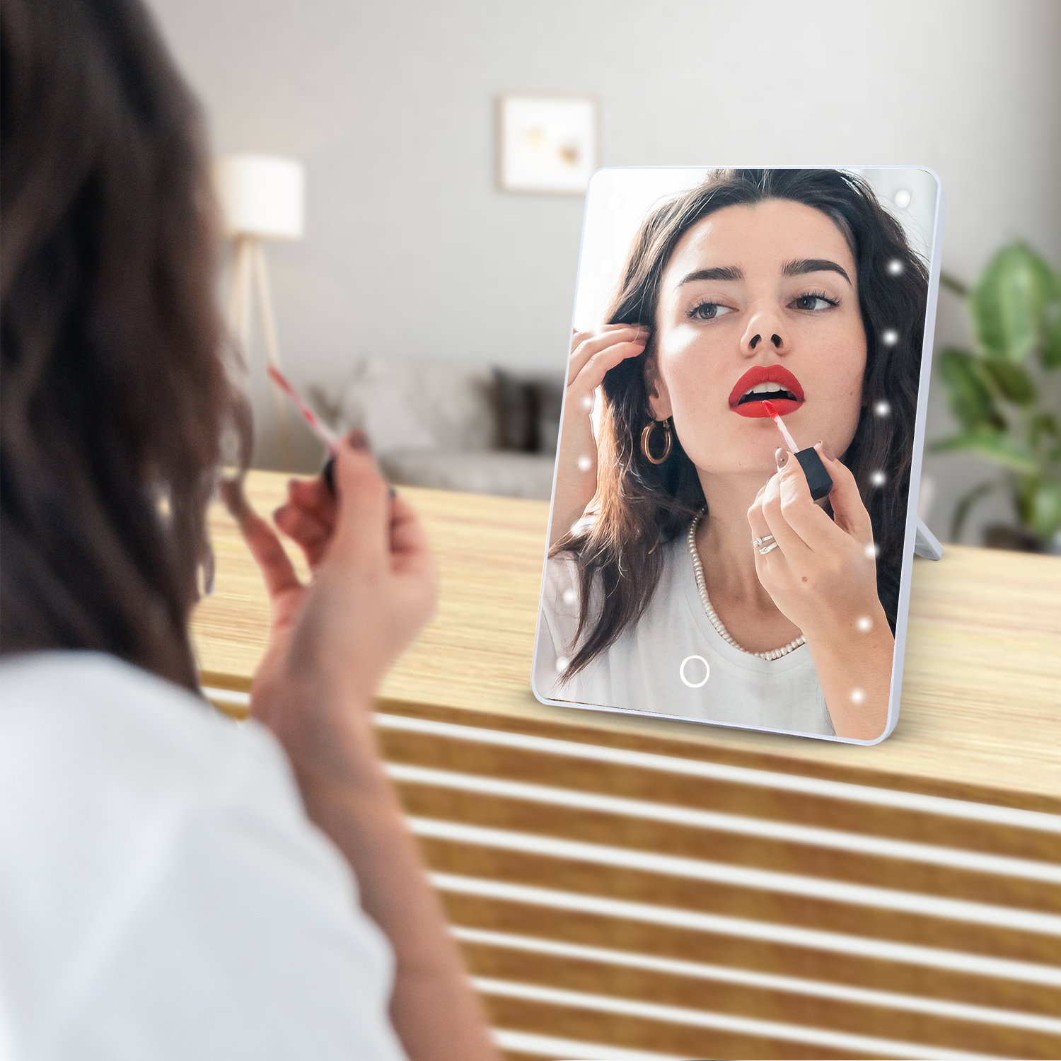 Smart Mirror Touchscreen Makeup Vanity with LED lights and adjustable angles, perfect for makeup application.