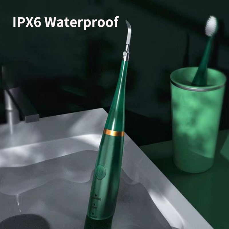 Smart Sonic Dental Scaler Electric Toothbrush with USB charging, featuring multiple heads and waterproof design.