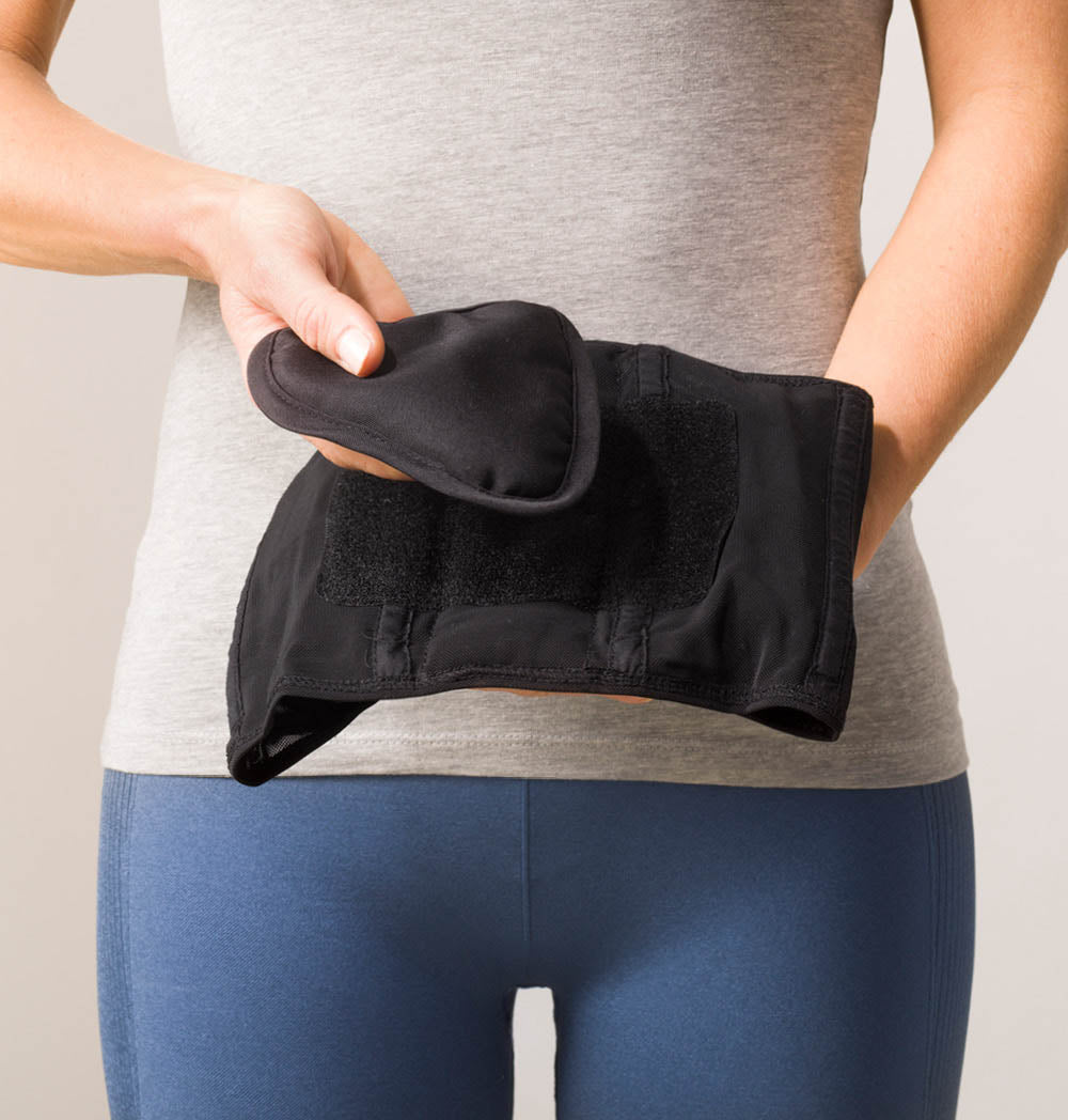 Stabilize Lumbar Back Belt with thermo-pillow for lower back support and pain relief.