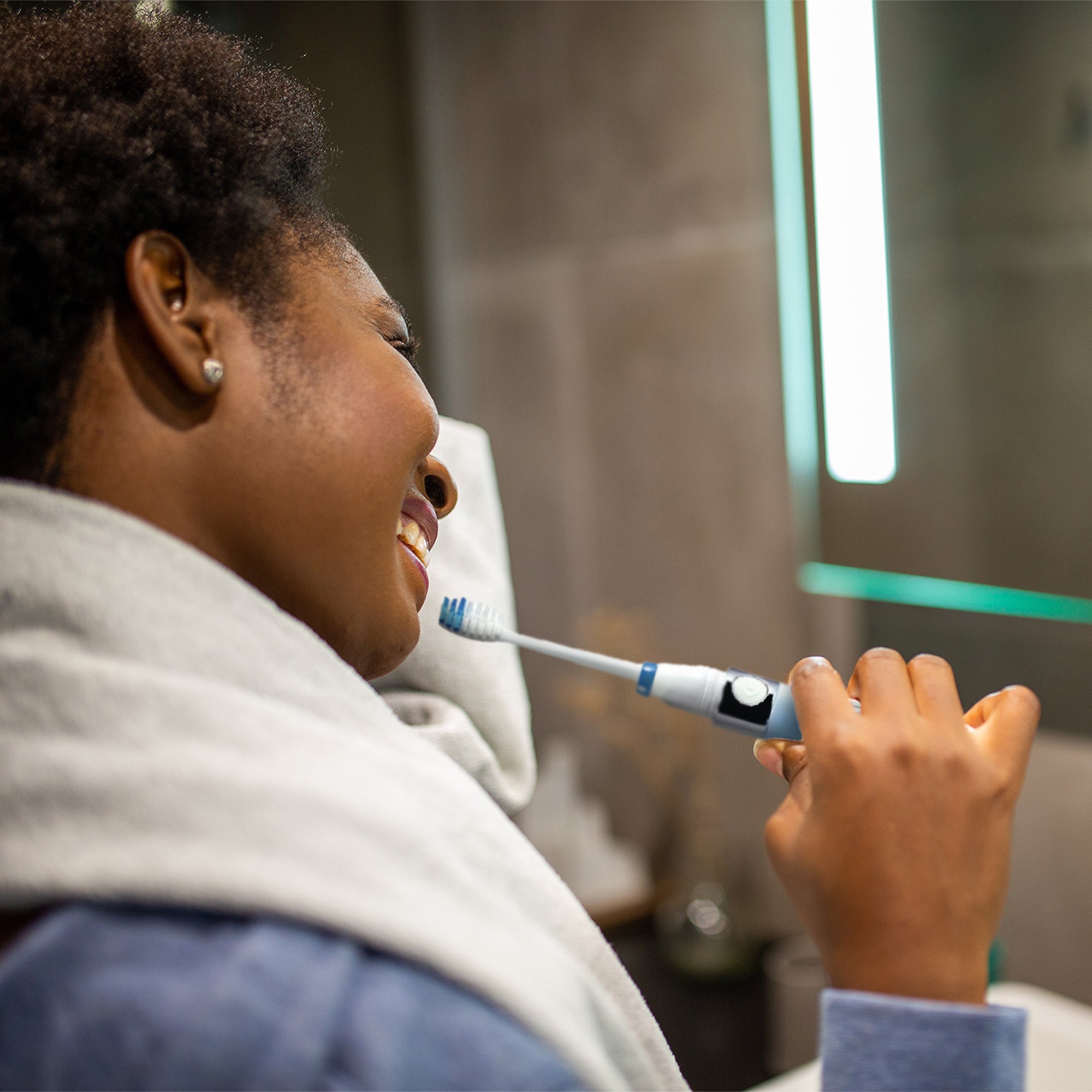 Travel Oral Care Essentials Bundle featuring a Portable UV Toothbrush Sanitizer and a Portable Sonic Toothbrush, designed for hygiene and convenience.