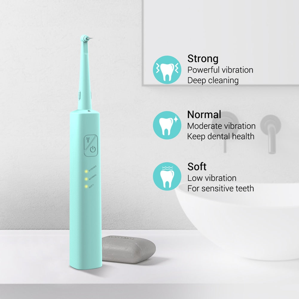 Ultrasonic Dental Washer Portable Dental Scaler with USB charging, accessories including dental mirror and cleaning heads, designed for effective plaque removal.