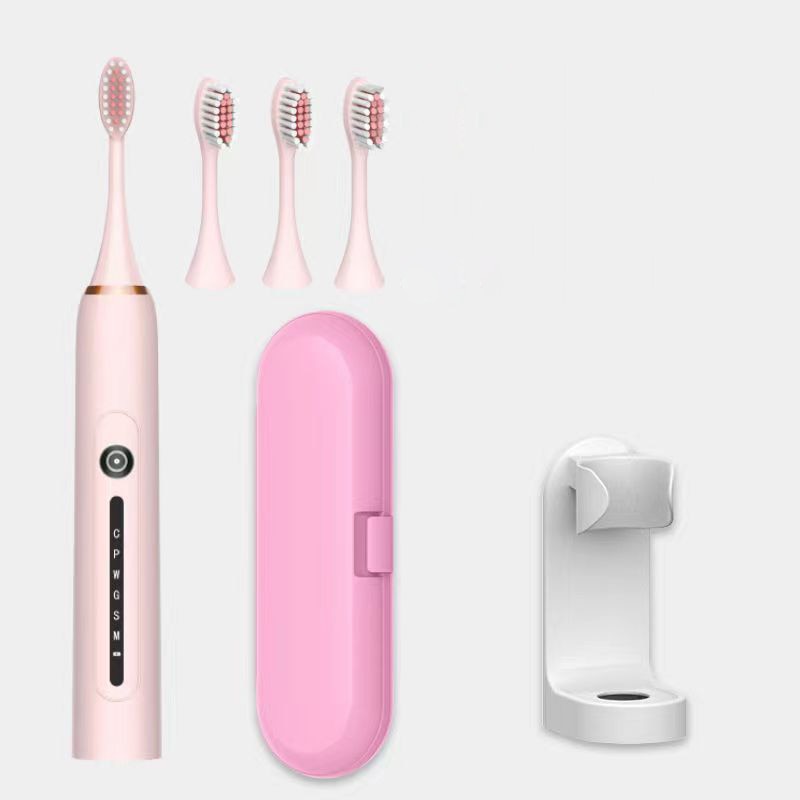 Ultrasonic Sonic Electric Toothbrush with USB charger and multiple brush heads, showcasing its sleek design and advanced features.