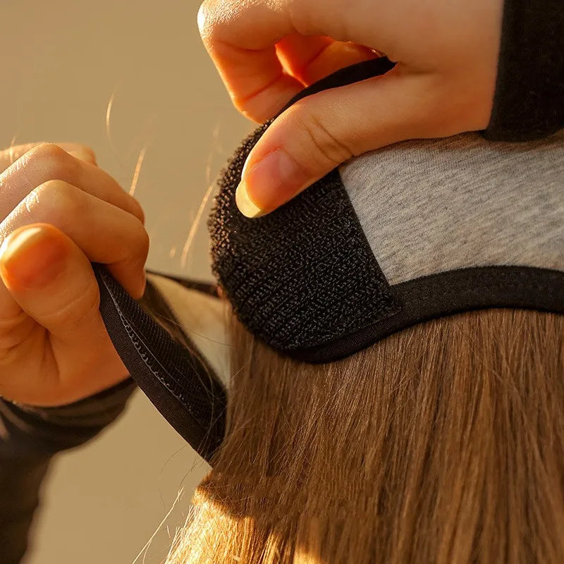 A pair of winter warm ear muffs for women, featuring a soft fabric design that combines an eye mask and ear cover for ultimate comfort and warmth.