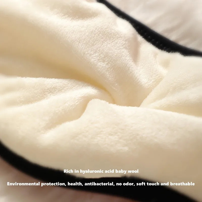 A pair of winter warm ear muffs for women, featuring a soft fabric design that combines an eye mask and ear cover for ultimate comfort and warmth.