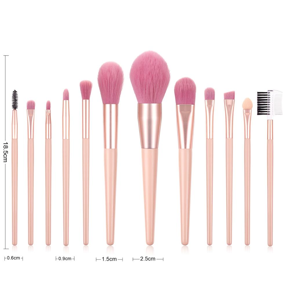 A stylish 12-piece nude pink makeup brush set featuring various brushes for flawless makeup application, including eyelash curlers and eyeshadow brushes.