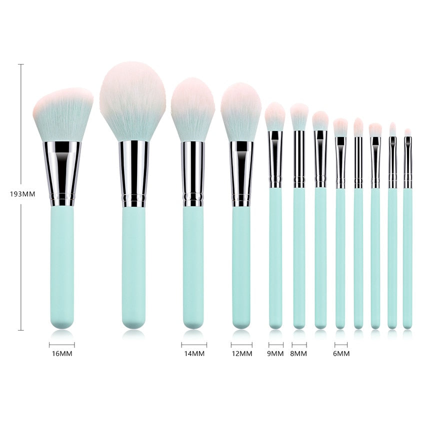 A set of 12 light blue makeup brushes with wooden handles and nylon bristles, arranged neatly in a PU bag.