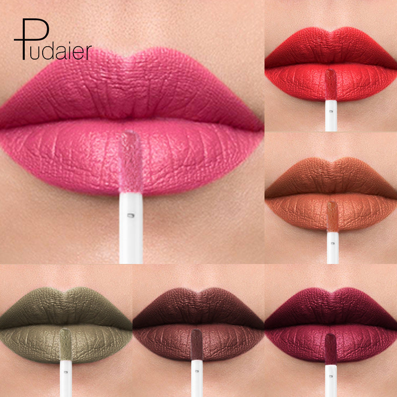 A collection of 36 vibrant matte lip gloss shades displayed in a stylish arrangement, showcasing a variety of colors from bold reds to soft nudes.