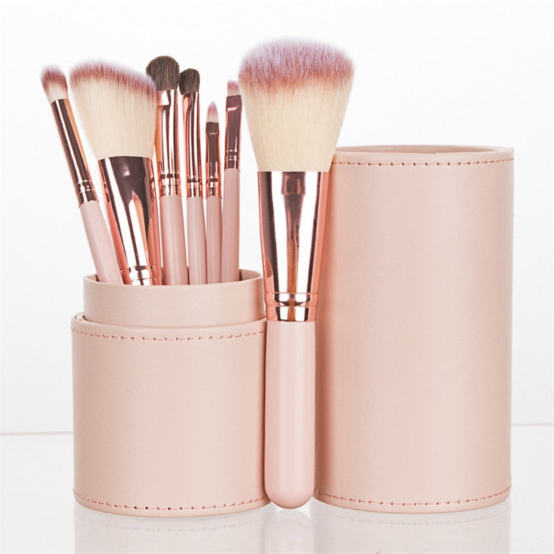 7PC Makeup Brush Set in a pink blush case, featuring high-quality nylon hair brushes with wood handles, perfect for makeup application.