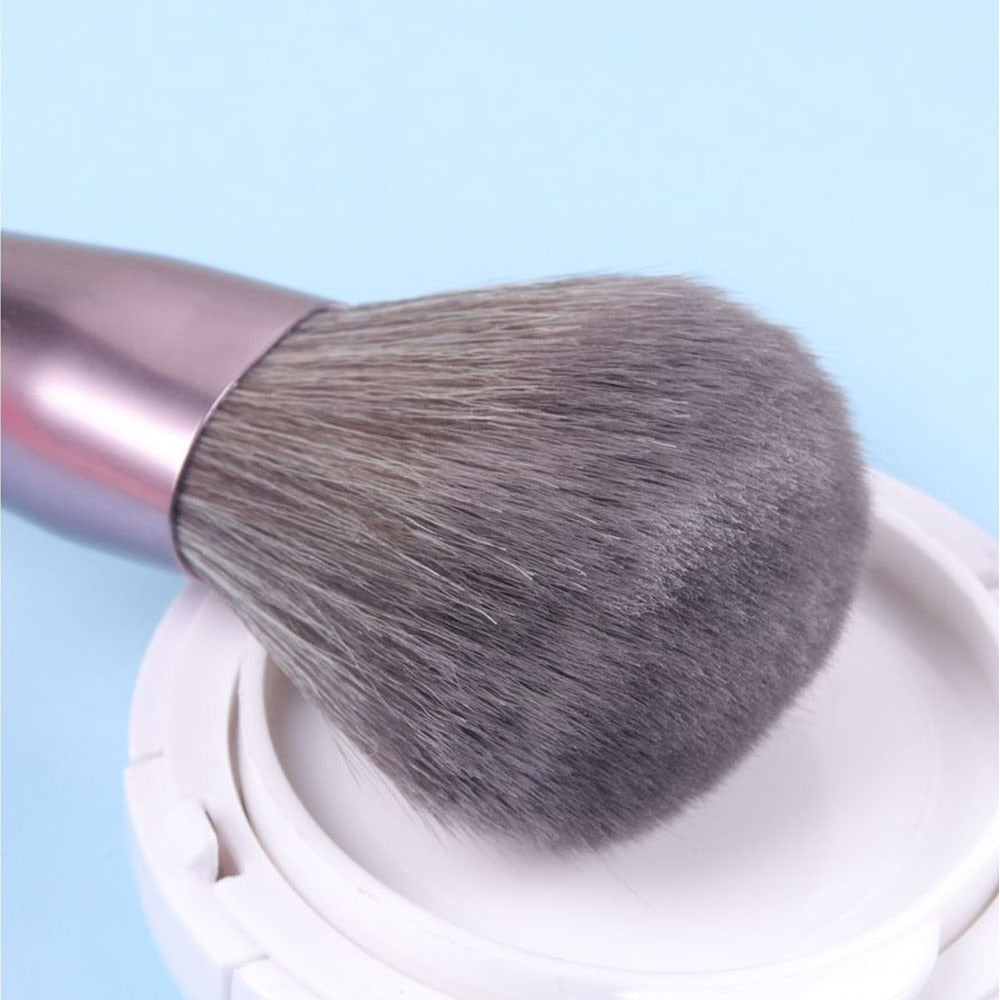 7PC Makeup Brush Set in a pink blush case, featuring high-quality nylon hair brushes with wood handles, perfect for makeup application.