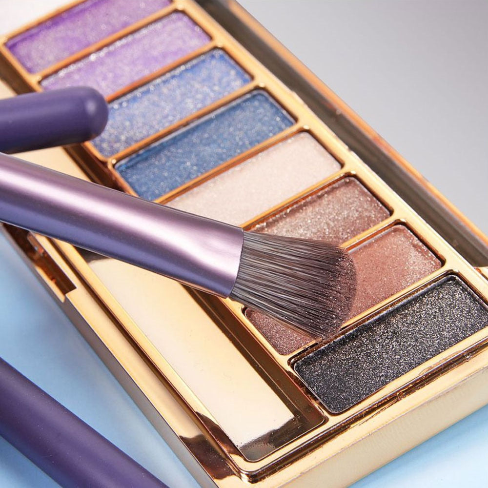 7PC Makeup Brush Set in a pink blush case, featuring high-quality nylon hair brushes with wood handles, perfect for makeup application.