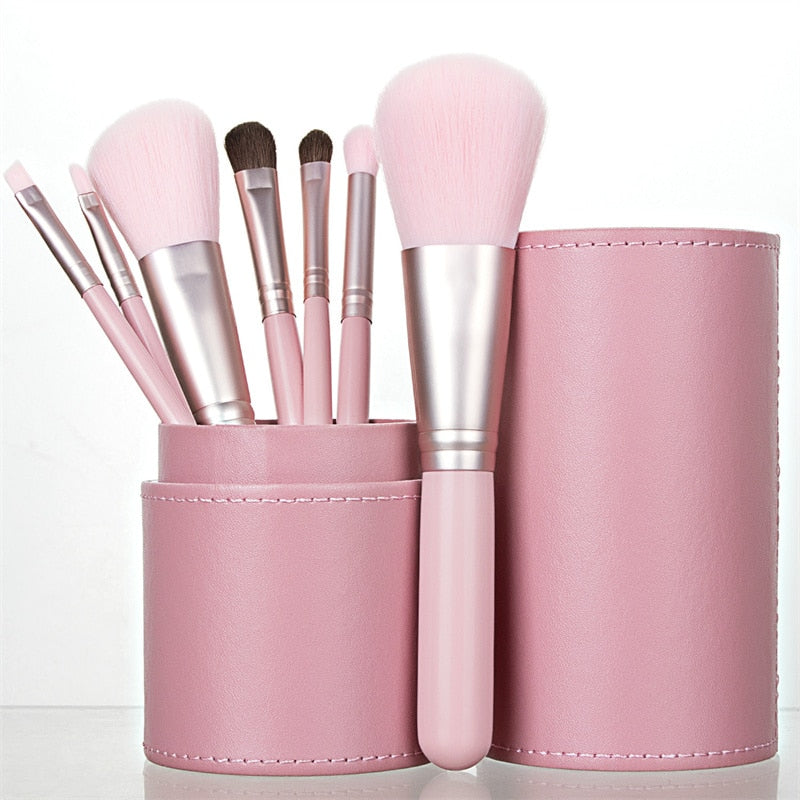 7PC Makeup Brush Set in a pink blush case, featuring high-quality nylon hair brushes with wood handles, perfect for makeup application.