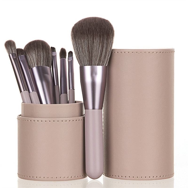 7PC Makeup Brush Set in a pink blush case, featuring high-quality nylon hair brushes with wood handles, perfect for makeup application.