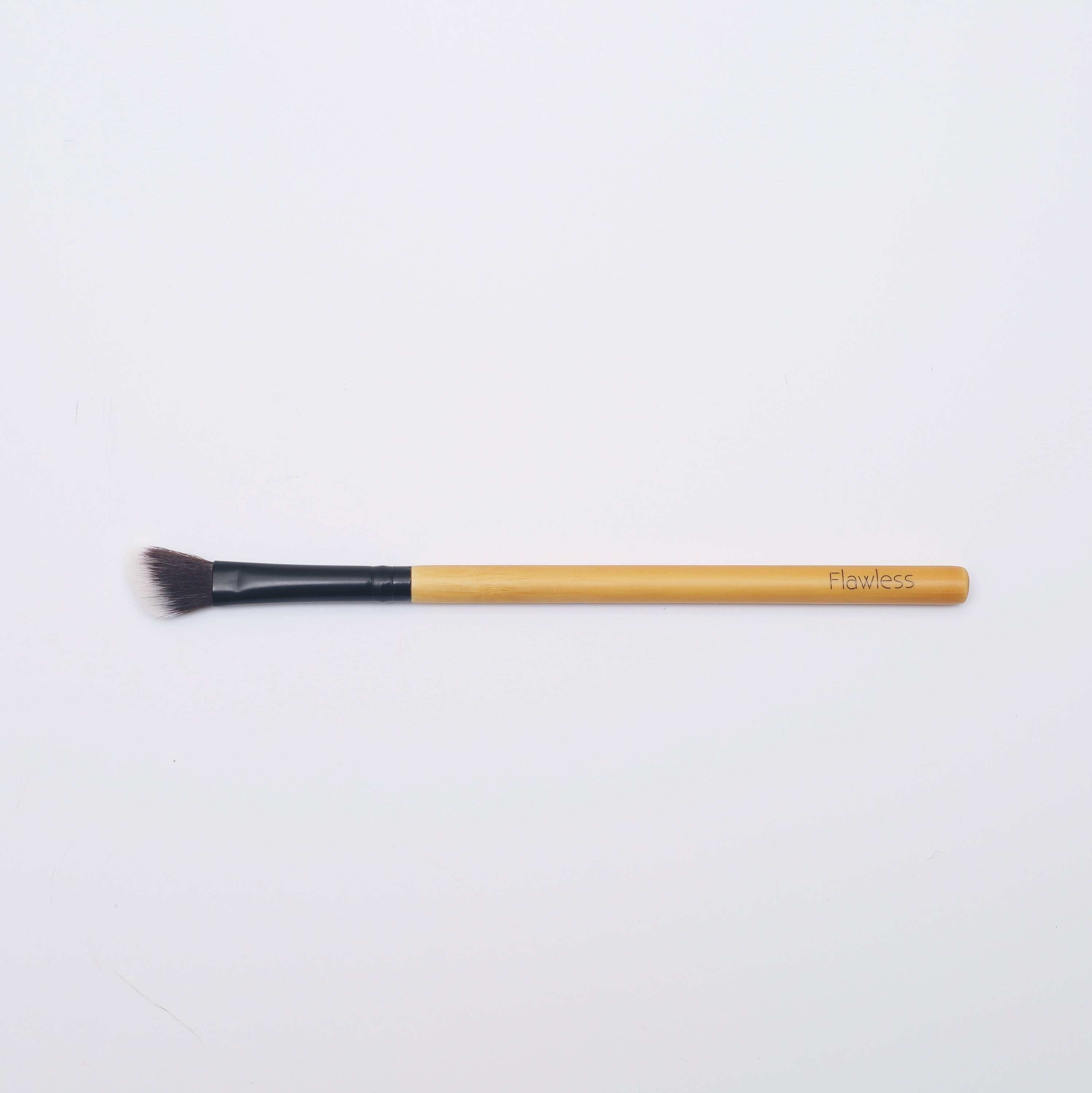 Angled Blending Bamboo Makeup Brush with soft synthetic bristles and durable bamboo handle, ideal for contouring and blending makeup.