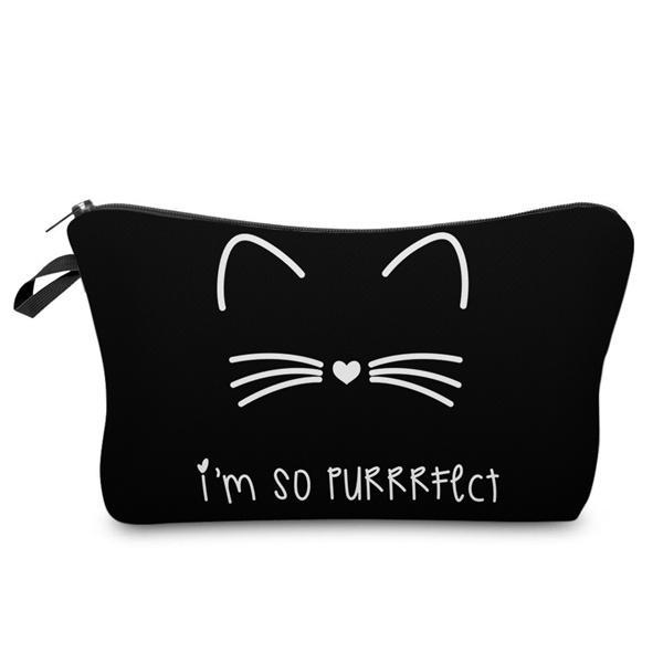 A stylish black cosmetic bag featuring a playful black cat print, perfect for organizing makeup and beauty essentials.