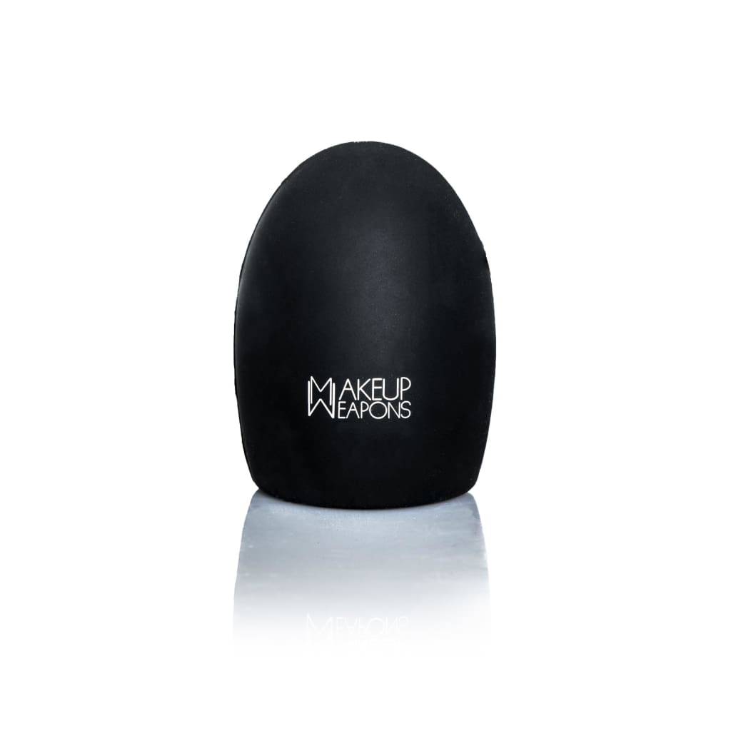 Brush Exfoliator Pad designed for deep cleaning makeup brushes, featuring small knobs and grooves for effective lathering.