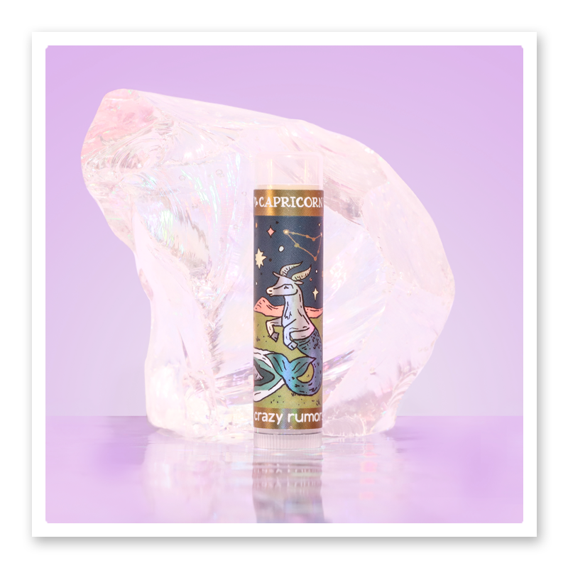 Capricorn lip balm in a 0.15oz tube, featuring a sweet vanilla and rose flavor profile, elegantly packaged in a gift box.