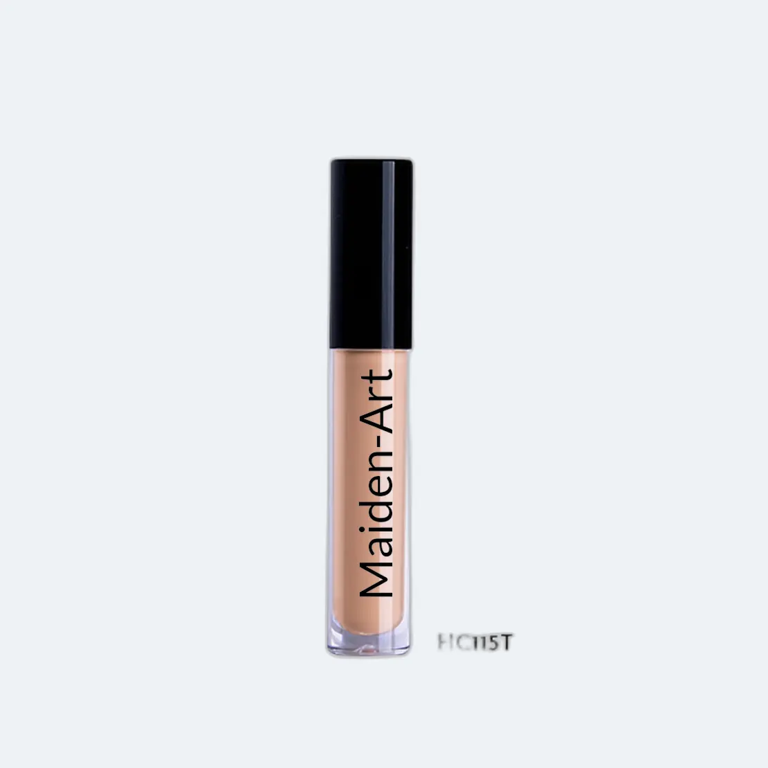 Cream Concealer in Tan with doe foot applicator, showcasing its blendable texture and full coverage capabilities.