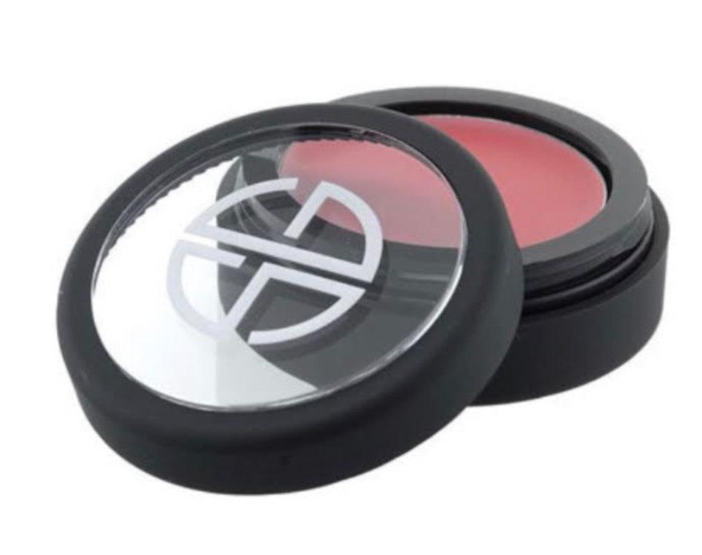 Studio Gear Cosmetics Cream to Powder Blush in a compact, showcasing its soft texture and natural color.