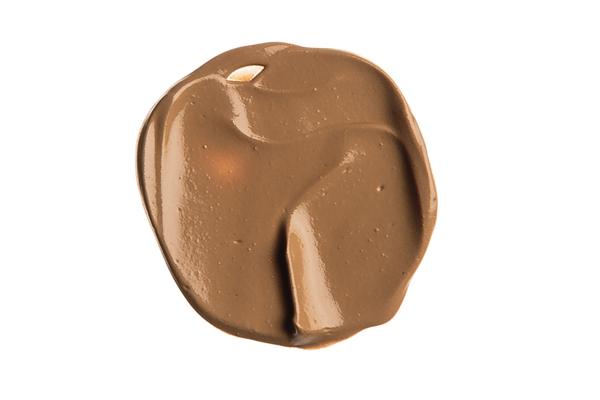 A collection of Foundation & Concealer Kits showcasing various shades for different skin tones, featuring elegant packaging.