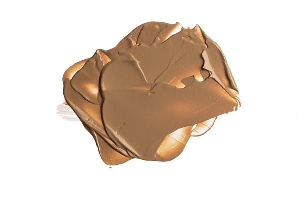 A collection of Foundation & Concealer Kits showcasing various shades for different skin tones, featuring elegant packaging.