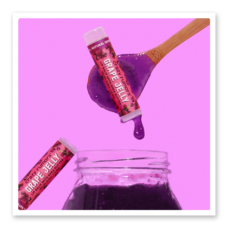 A tube of Grape Jelly showcasing its vibrant purple color and natural ingredients, perfect for spreading on sandwiches.