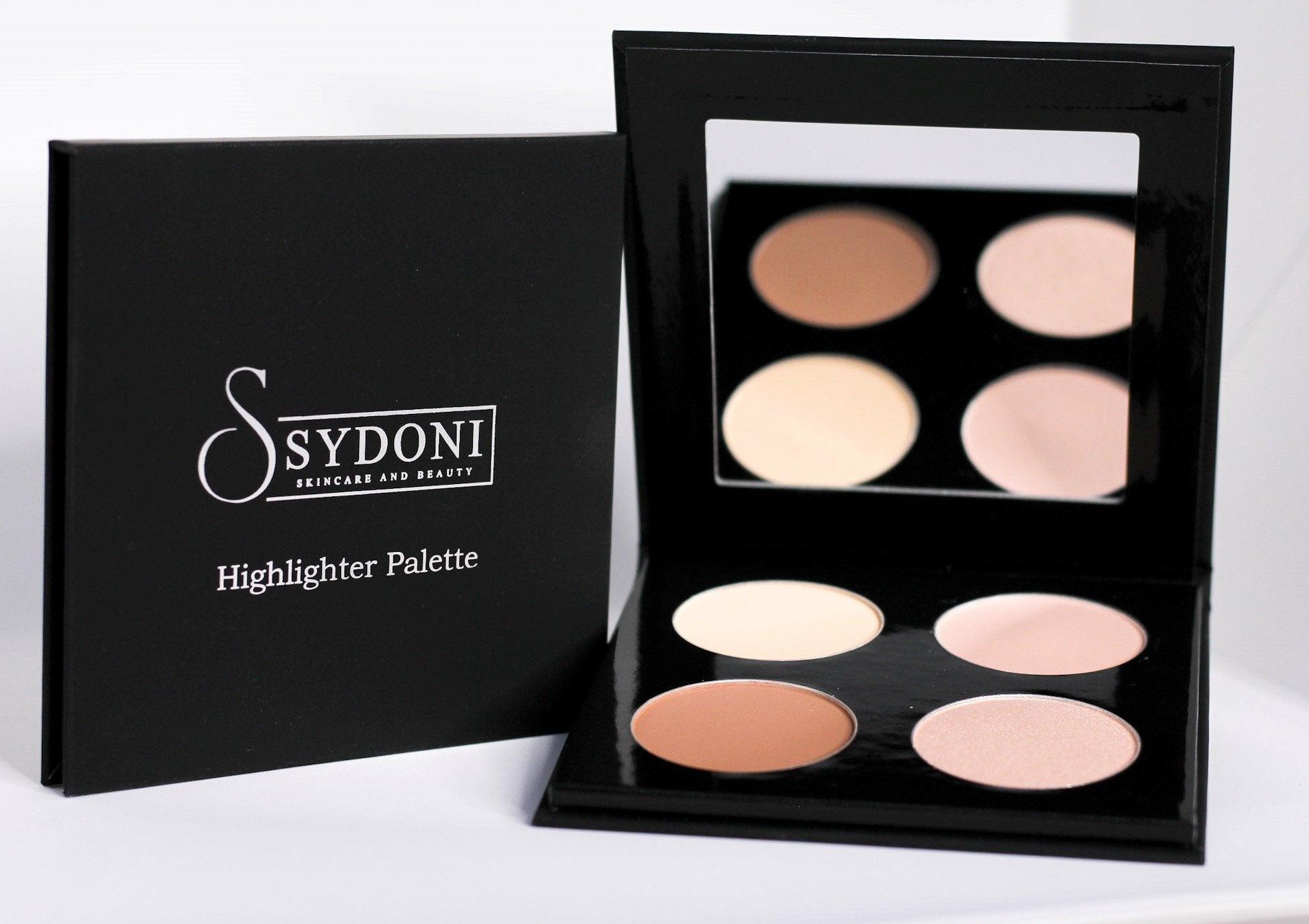 Highlight and Contour Palette (Light) showcasing multiple finely-milled shades for professional makeup application.