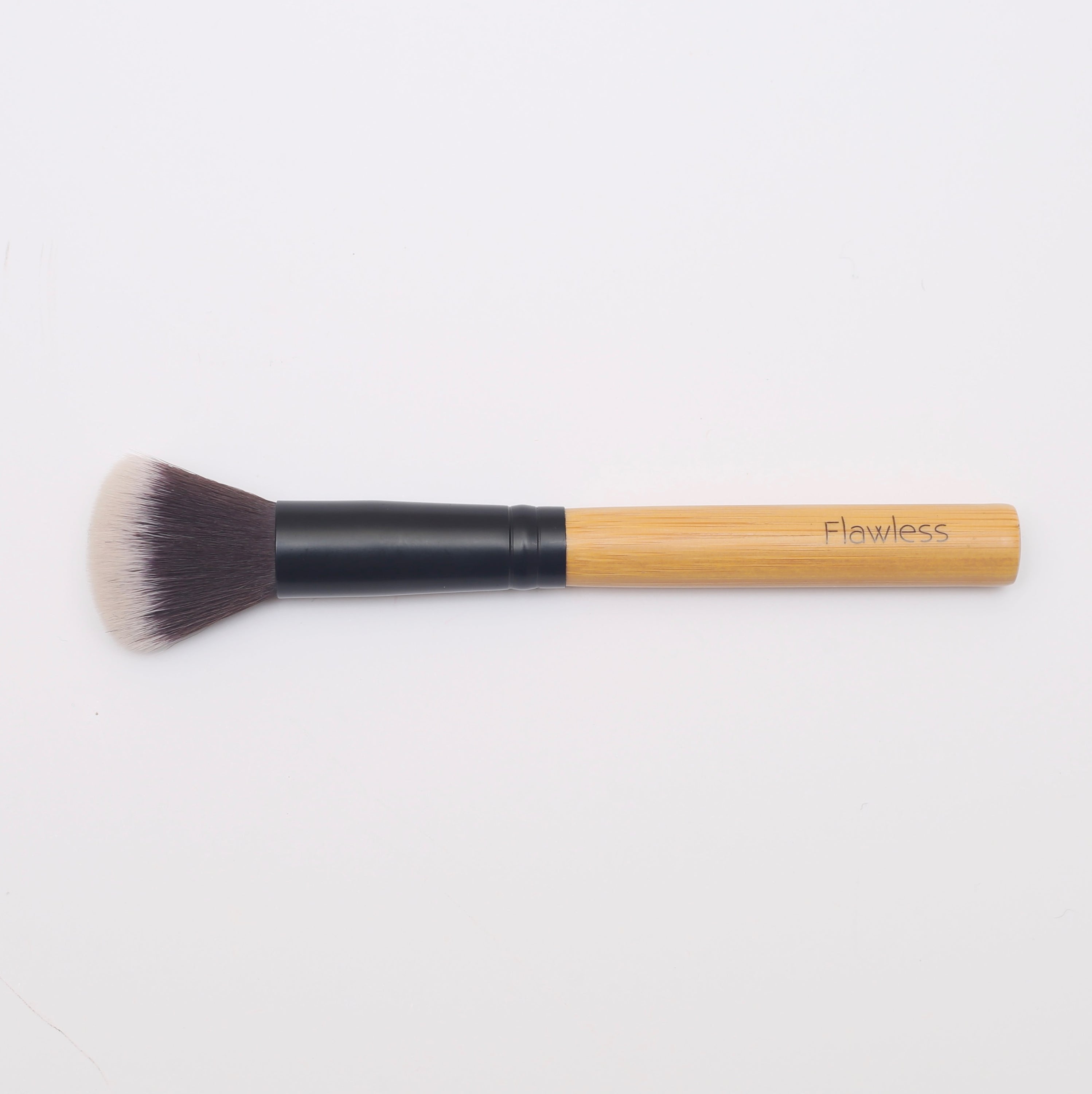 Flawless Highlighting Brush with soft bristles and narrow head for precision highlighting.