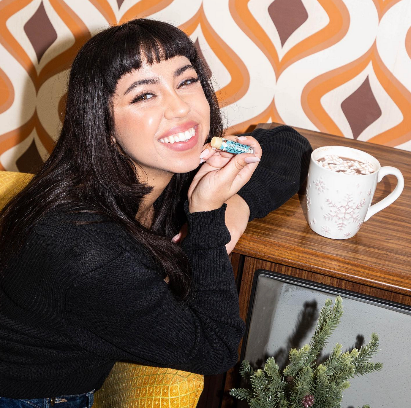 A cozy cup of rich hot cocoa topped with fluffy marshmallows, perfect for chilly days.