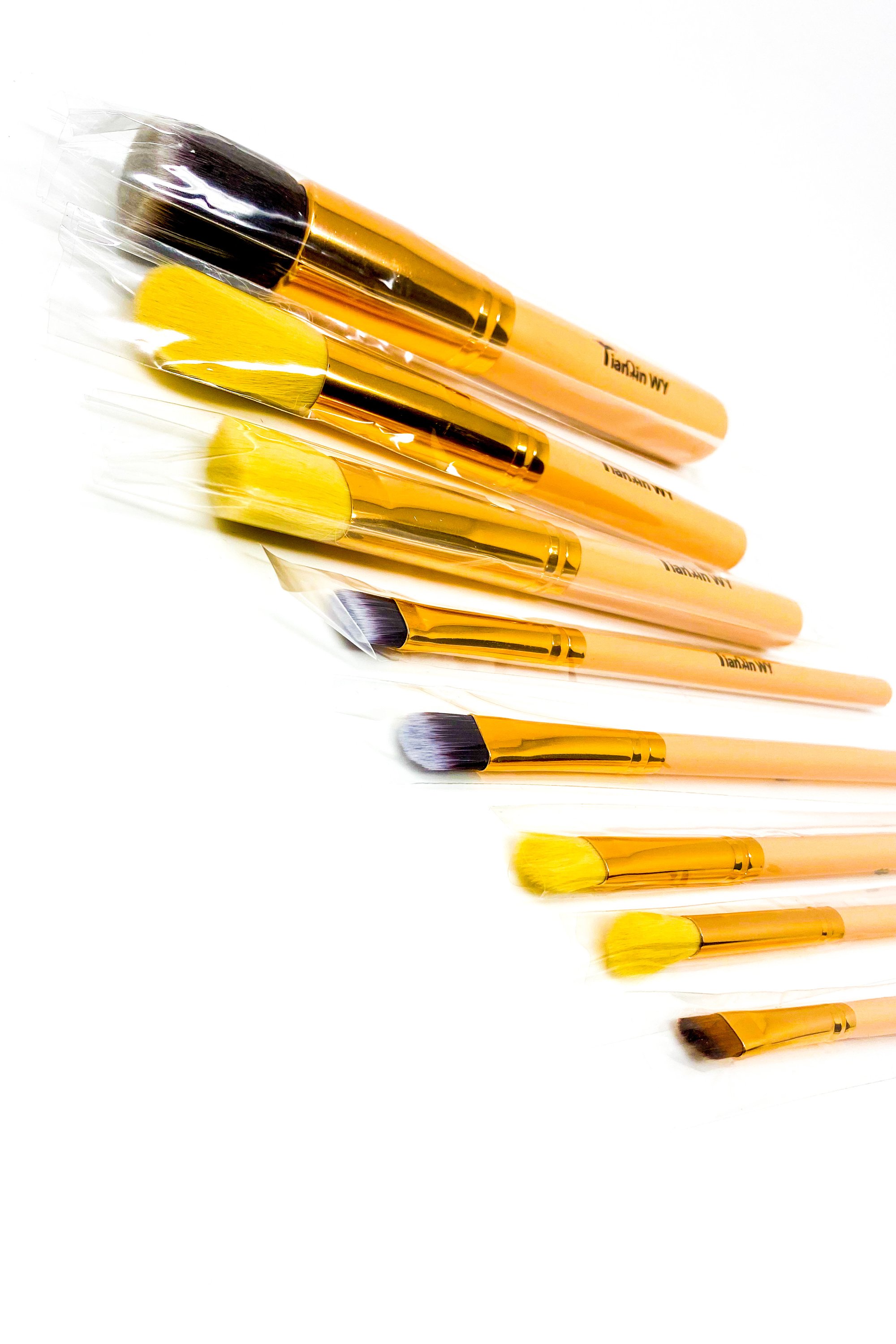 Everything Beat 10 Piece Makeup Brush Set featuring various brushes in multiple colors with a resealable storage tote.