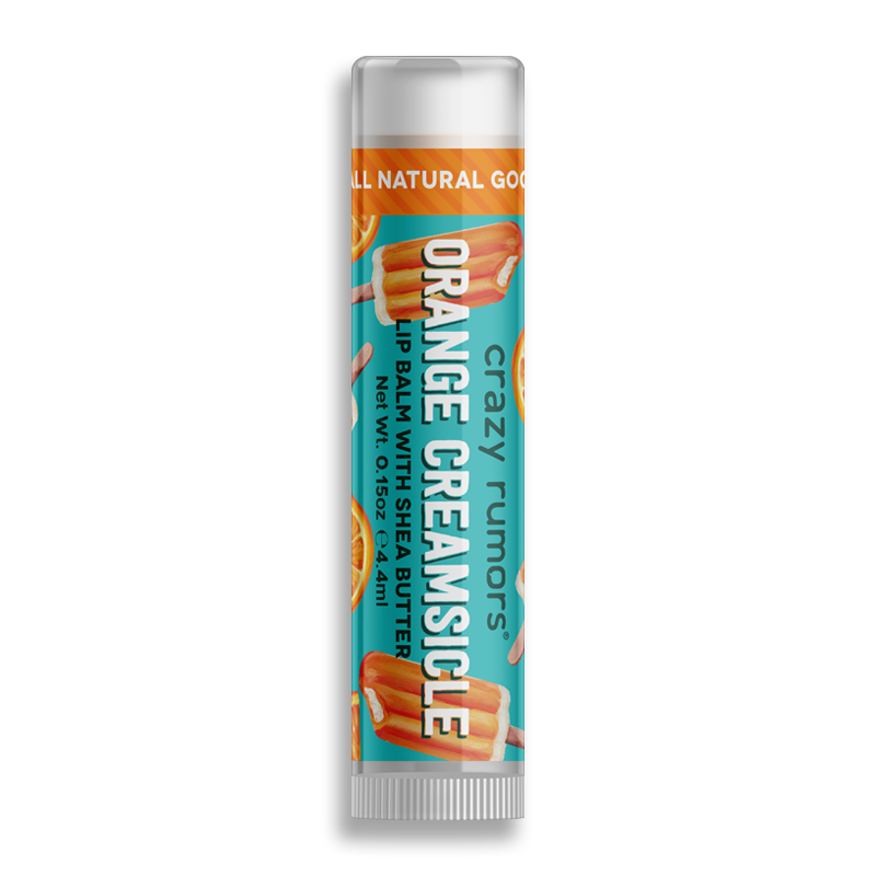 A vibrant tube of Orange Creamsicle, showcasing its fruity orange and creamy vanilla design, perfect for skincare enthusiasts.