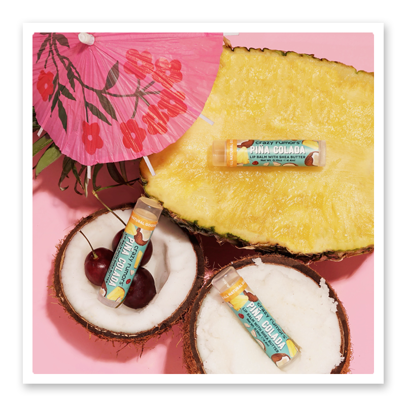 A vibrant Piña Colada product in a 0.15oz tube, featuring tropical pineapple and coconut imagery.
