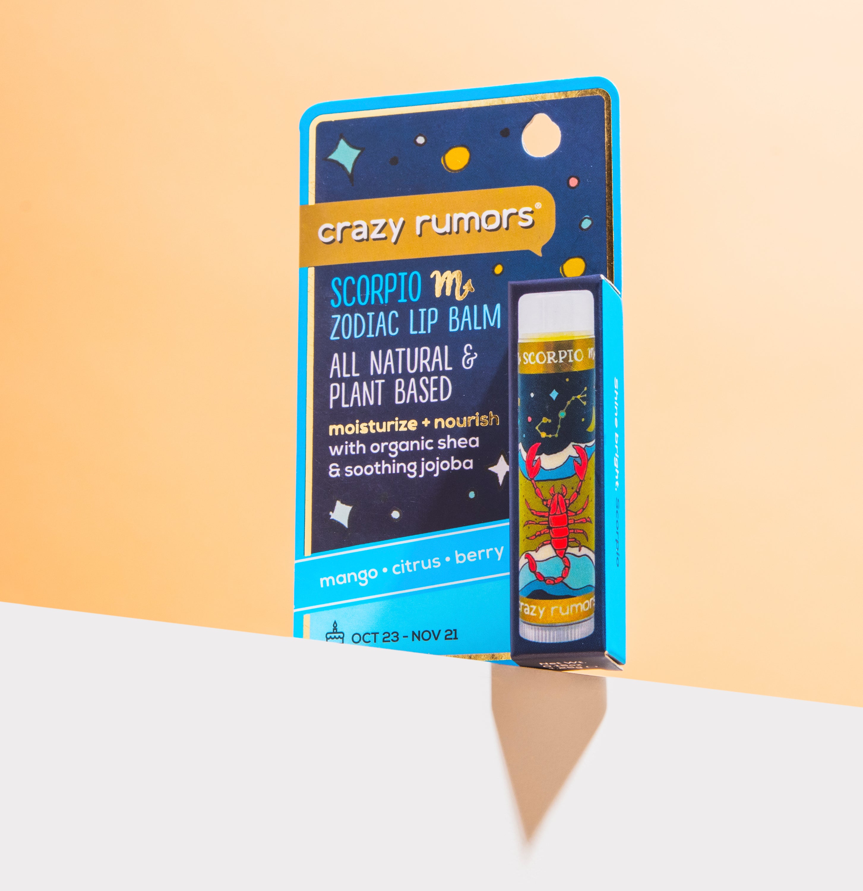 Scorpio lip balm in a 0.15oz tube with a tropical mango and citrus flavor profile, elegantly packaged in a gift box.