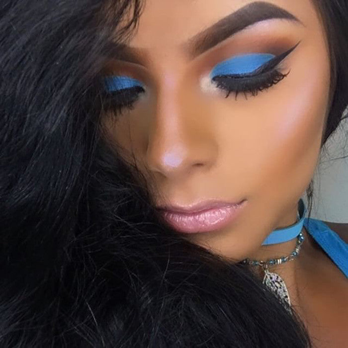 Supernova Iridescent Duochrome Loose Diamond Highlighter in a sleek container, showcasing its shimmering blue/violet powder.