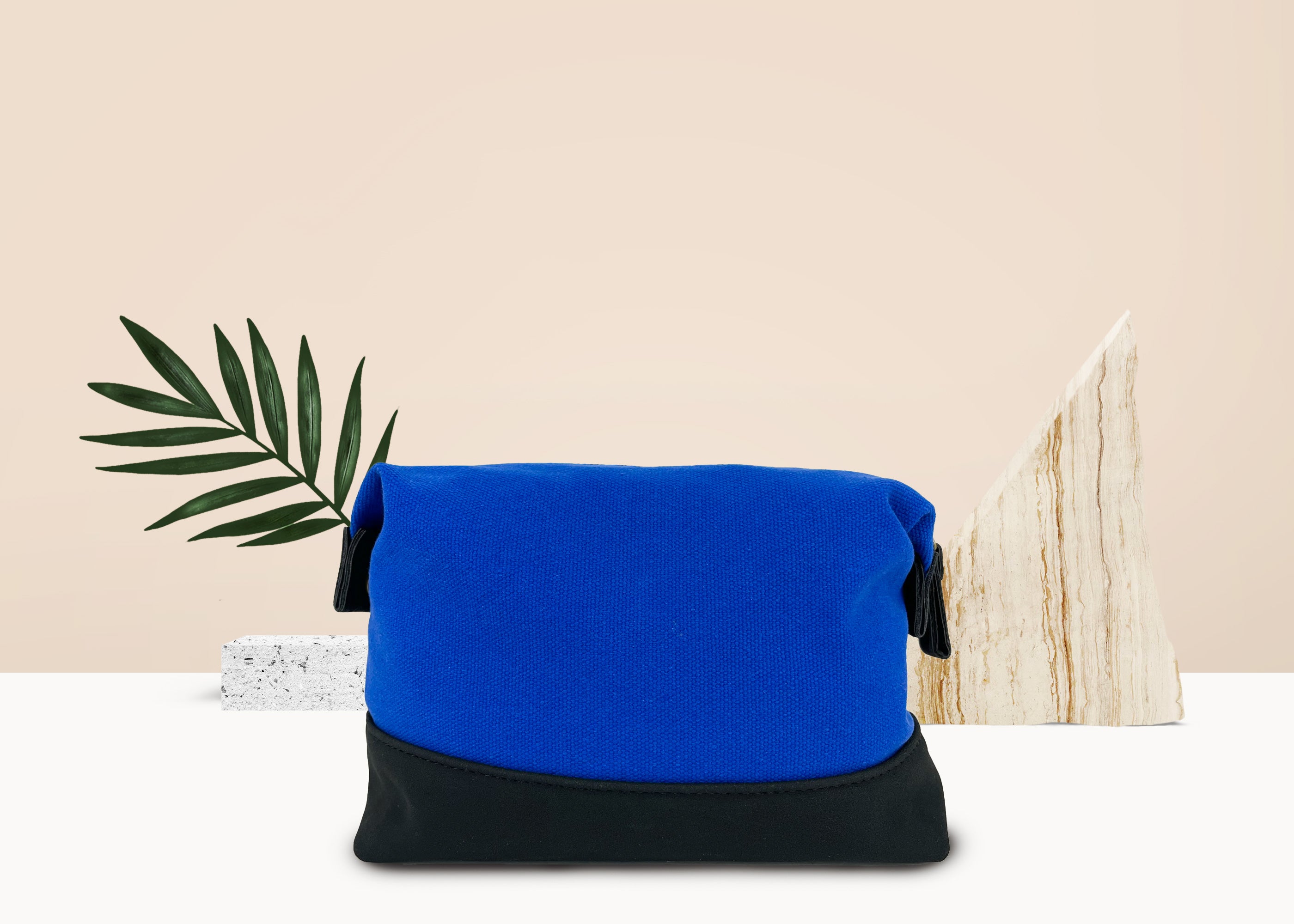 Travel Toiletry Bag in Cobalt Blue, featuring a stylish design with snap-down sides and eco-friendly materials for organized travel.