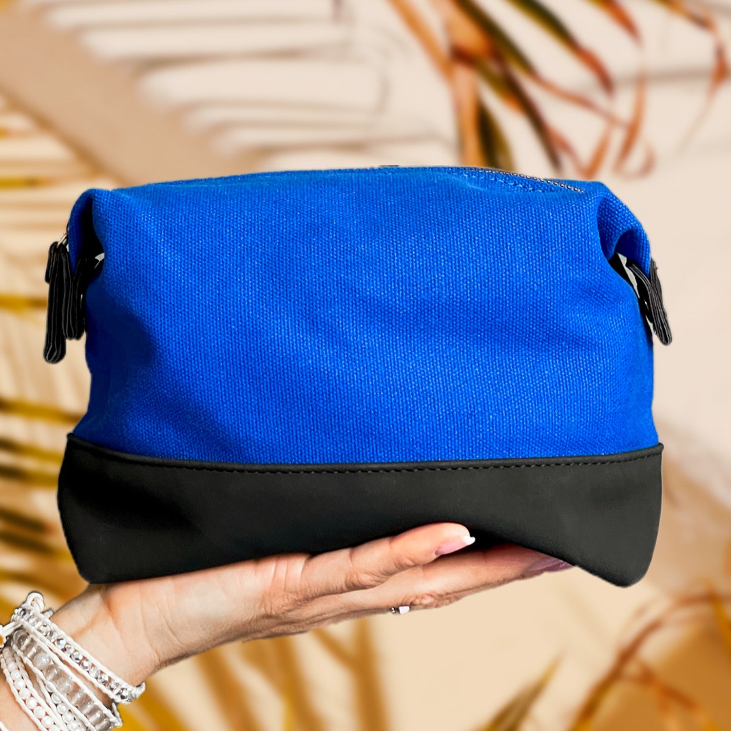 Travel Toiletry Bag in Cobalt Blue, featuring a stylish design with snap-down sides and eco-friendly materials for organized travel.