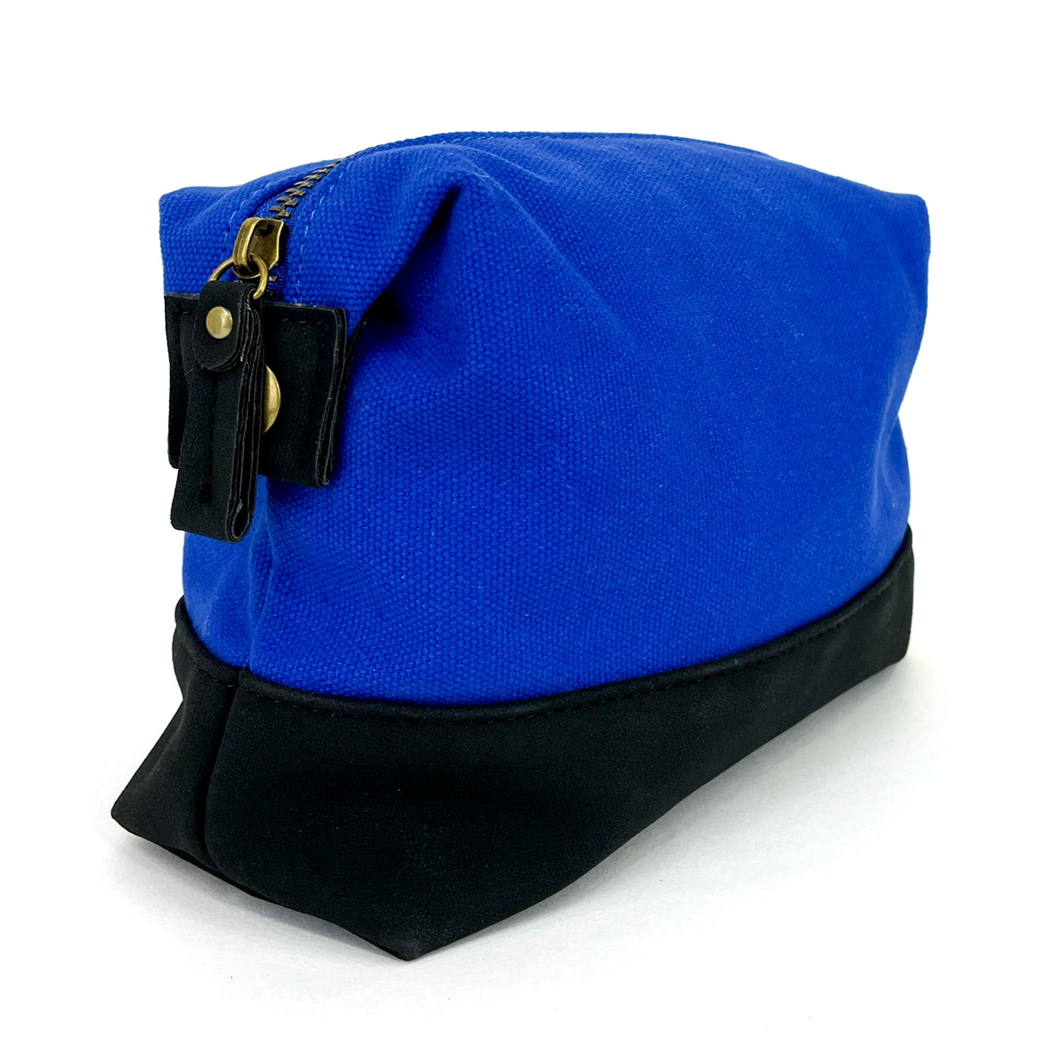 Travel Toiletry Bag in Cobalt Blue, featuring a stylish design with snap-down sides and eco-friendly materials for organized travel.