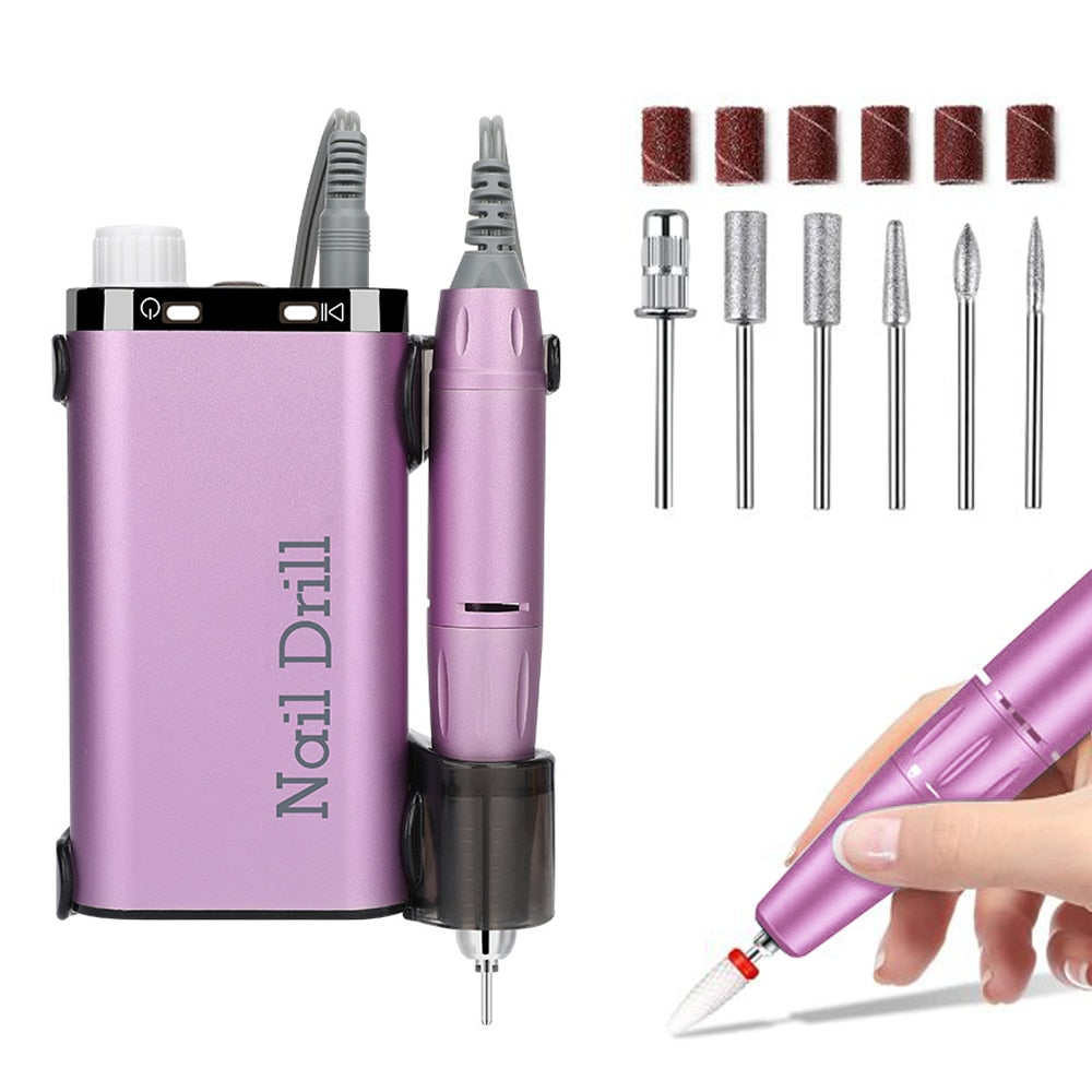 35000RPM Electric Nail Drill with various metal bits and a sleek design, perfect for manicures and pedicures.