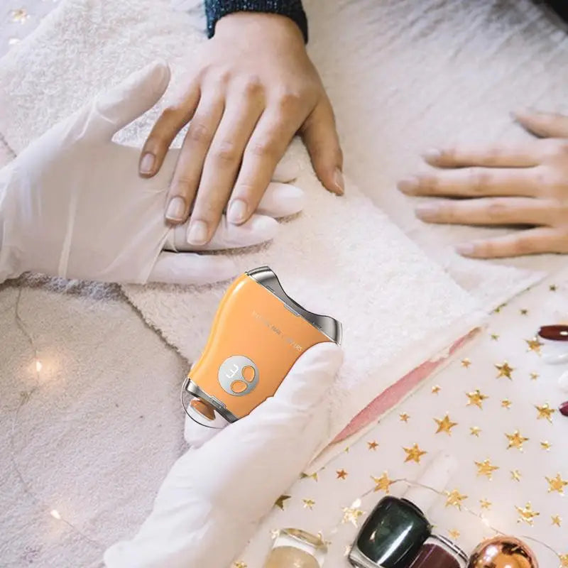 Electric Nail Cutter in mango shape with 3-speed settings, showcasing its ergonomic design and built-in nail shavings storage.