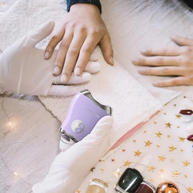 Electric Nail Cutter in mango shape with 3-speed settings, showcasing its ergonomic design and built-in nail shavings storage.