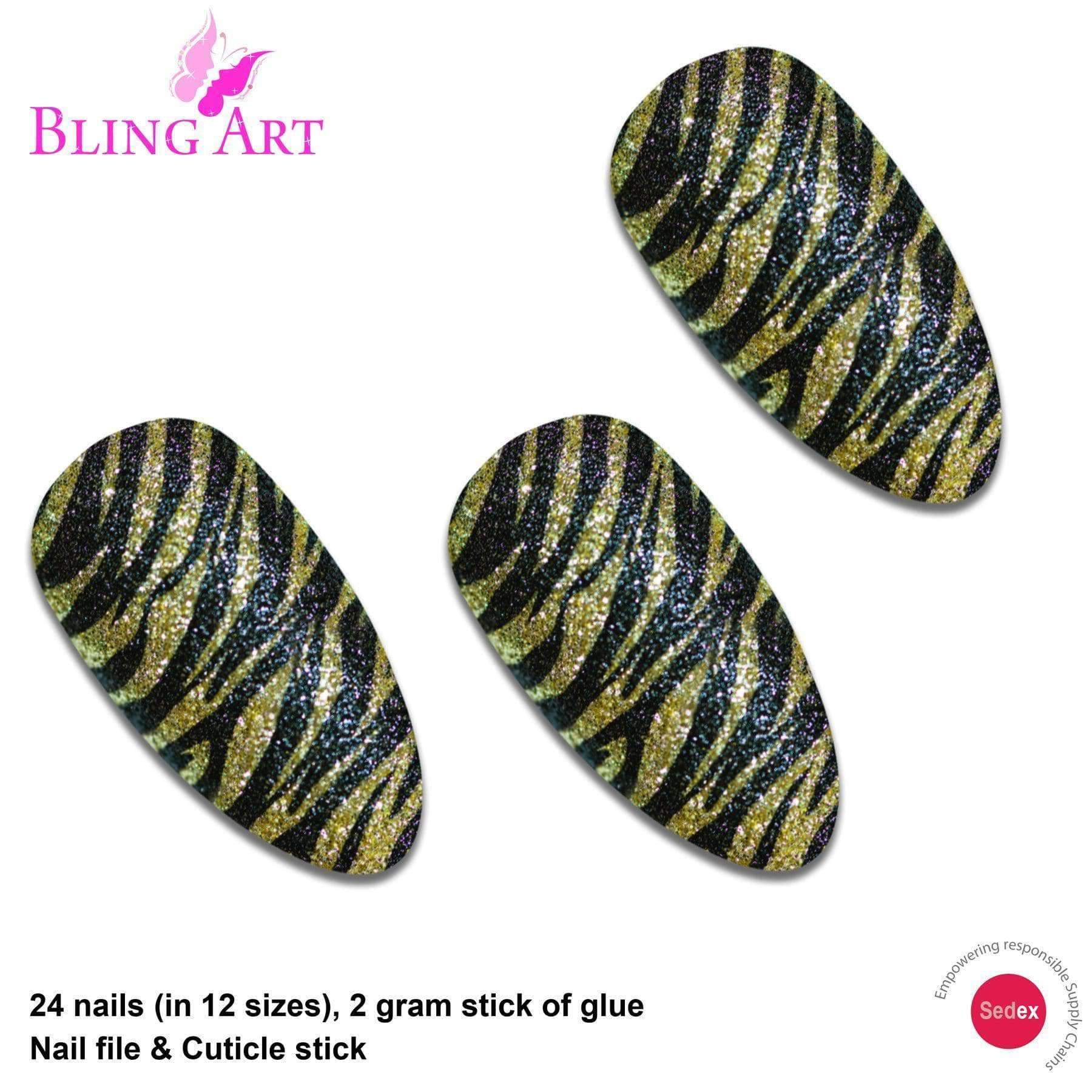 A set of 24 long almond stiletto false nails in black and gold glitter design, accompanied by a glue stick, nail file, and cuticle stick.